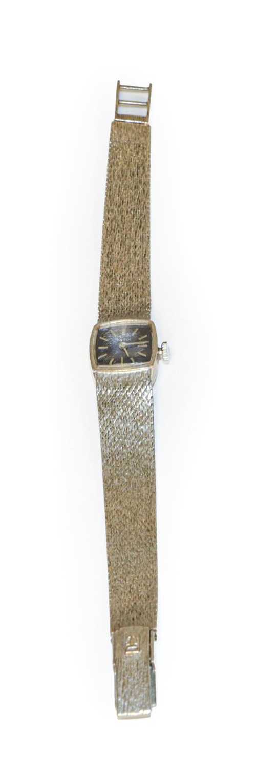 Lot 135 - A lady's 9 carat white gold wristwatch, signed...