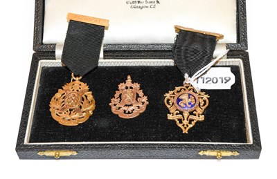 Lot 157 - Three 9 carat gold medals, two inscribed...
