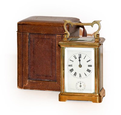Lot 185 - A brass carriage clock alarm timepiece in...
