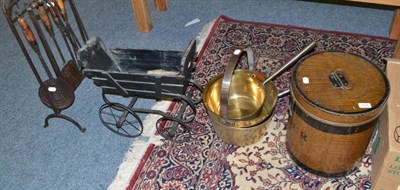 Lot 805 - A brass preserve pan, two brass saucepans, a flour bin, reproduction doll's pram, a set of...