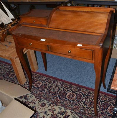 Lot 808 - A reproduction cherry wood tambour top desk