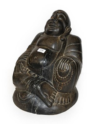 Lot 316 - A 19th century carved wooden Buddha, 40cm high