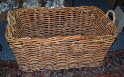 Lot 811 - A large wicker log basket