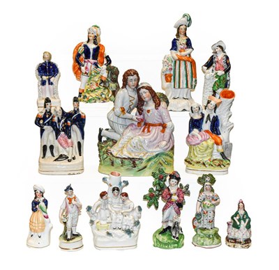 Lot 34 - A group of 19th century Staffordshire figures...