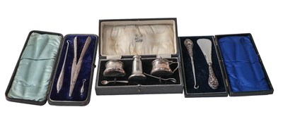 Lot 345 - A tray containing mainly cased silver items...