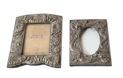Lot 349 - A Japanese silvered metal photograph frame,...