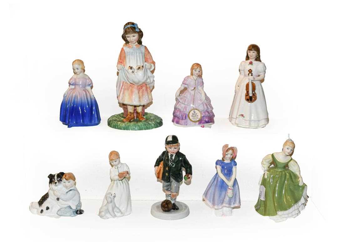 Lot 4 - A selection of nine Royal Doulton figures...