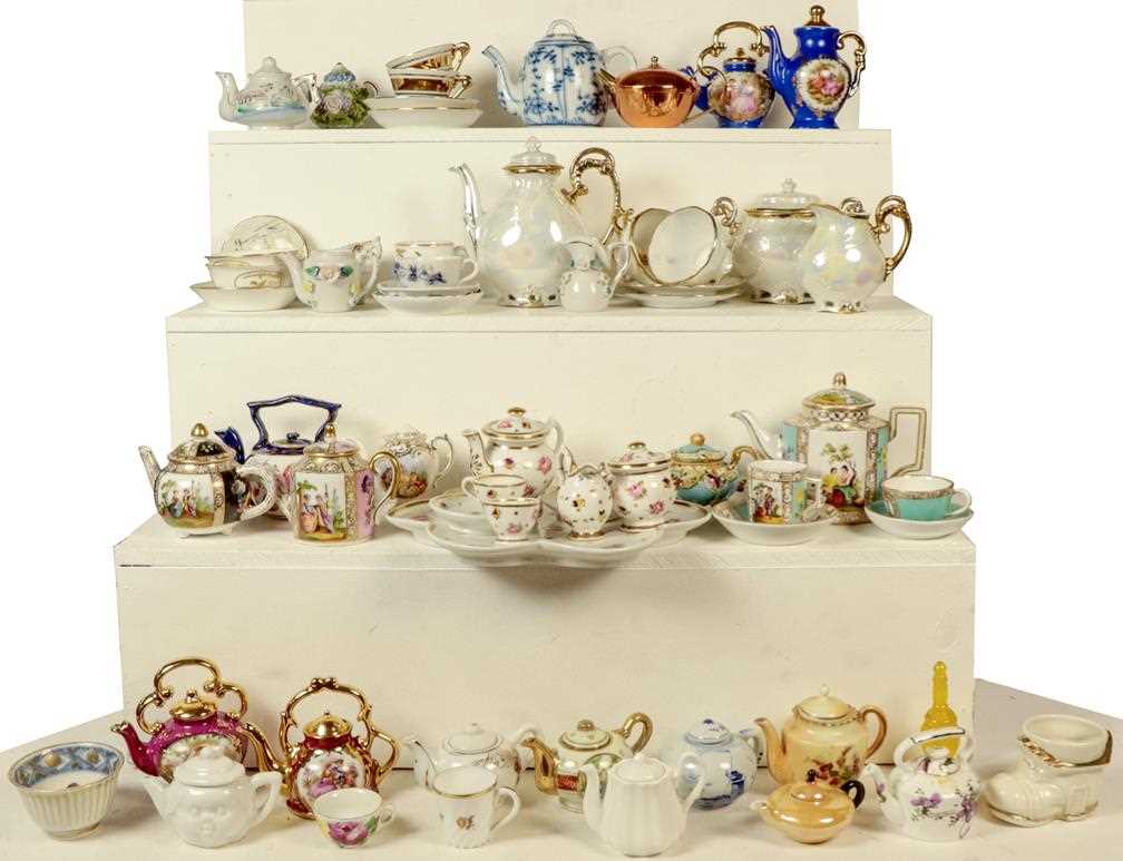Lot 77 - A quantity of miniature china teapots and...