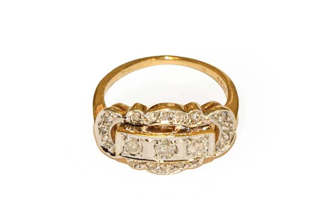 Lot 87 - A diamond three stone ring within an openwork...