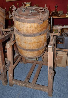 Lot 828 - A vintage butter churn by W B Hopperton, Darlington, with wooden stand