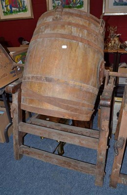 Lot 829 - A large butter churn on stand