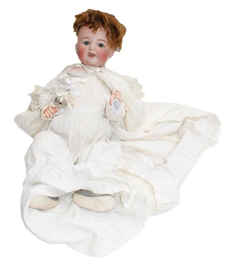 Lot 1013 - A Simon & Halbig 126 doll in a white cotton...