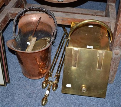 Lot 834 - A brass coal purdonium, a set of three brass fire irons, a copper coal scuttle, two small brass...