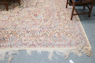 Lot 1158 - Kirman Carpet, the cream field of vines around...