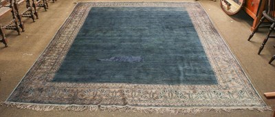 Lot 1173 - West Iranian carpet, the shaded indigo field...