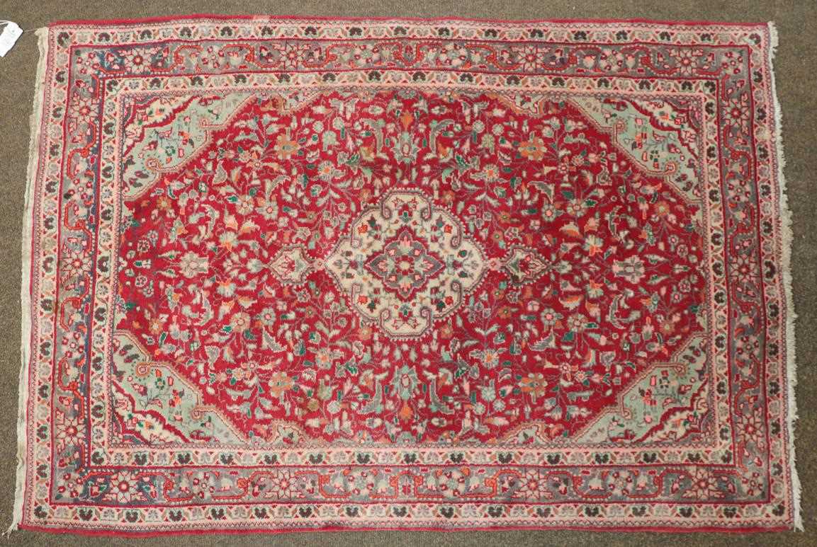 Lot 1181 - Indian rug, the raspberry field of vines...