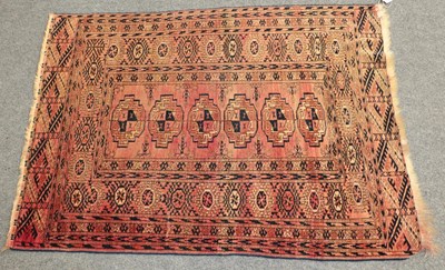 Lot 1184 - Tekke rug, the faded rose field with six...