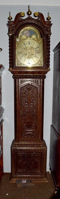 Lot 1194 - A carved oak eight day longcase clock, later...