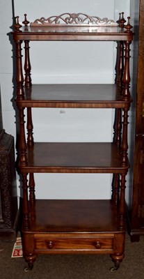 Lot 1198 - A Victorian mahogany four-tier whatnot stand...