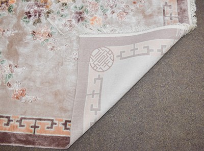 Lot 1219 - Chinese silk rug, the mushroom field framed by...