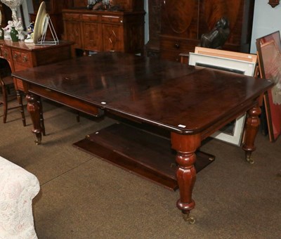 Lot 1243 - A Victorian mahogany extending dining table...