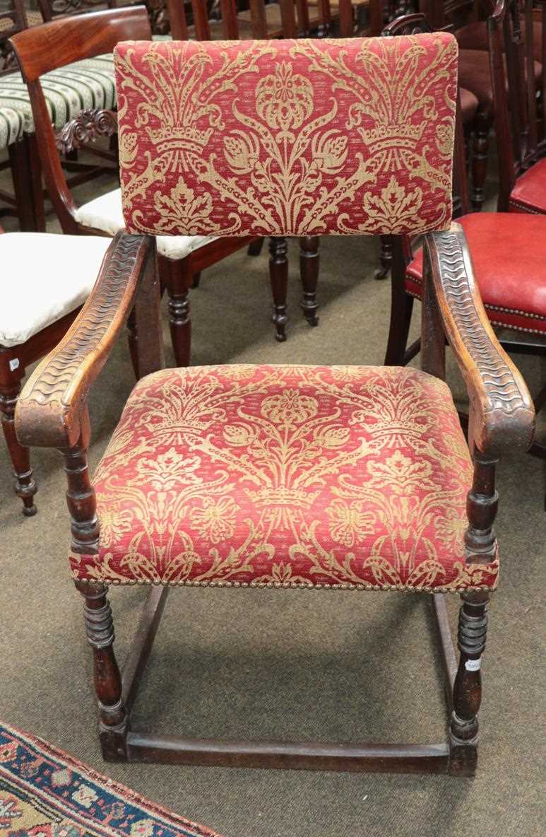 Lot 1248 - A 19th century part upholstered open armchair...