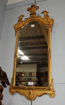 Lot 1265 - A George II style gilt wood pier glass, with...