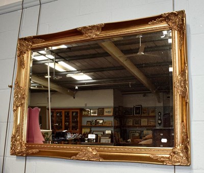 Lot 1268 - A modern gilt framed mirror with bevelled...