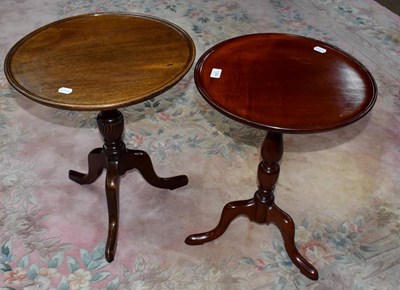 Lot 1284 - A mahogany tripod table with moulded dish top...