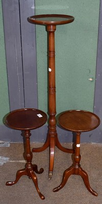 Lot 1289 - A pair of mahogany wine tables with dish tops,...