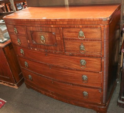 Lot 1311 - A 19th century mahogany bow front chest of...