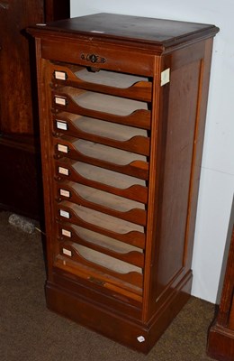 Lot 1318 - A 1920's tambour fronted stationary cabinet,...