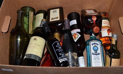 Lot 855 - Eleven assorted bottles including Bombay Sapphire, Famous Grouse, etc, also two empty bottles (13)