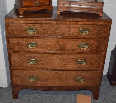 Lot 1340 - A Regency style mahogany chest of drawers with...
