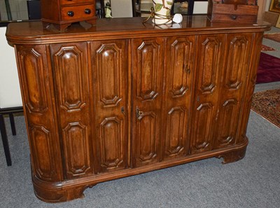 Lot 1354 - A 20th century mahogany three-drawer side...