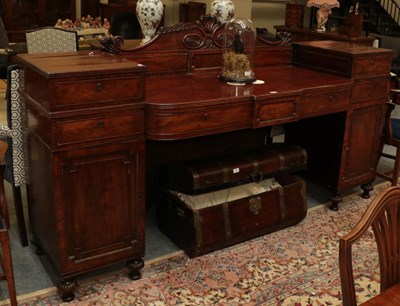 Lot 1359 - A 19th century mahogany sideboard, the central...