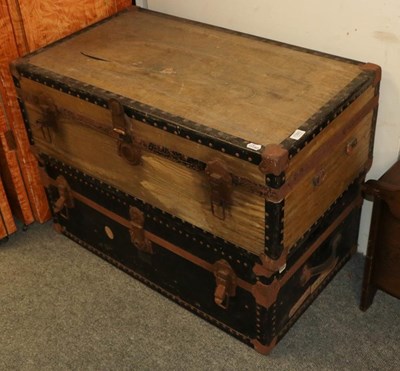 Lot 1393 - Two vintage travelling trunks, the largest...
