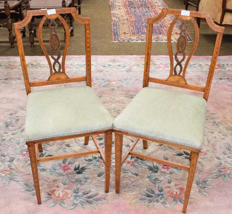 Lot 1225 - A pair of Edwardian satinwood bedroom chairs...