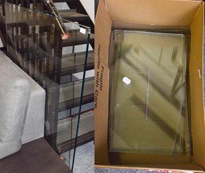 Lot 1347A - A contemporary glass coffee table, the square...