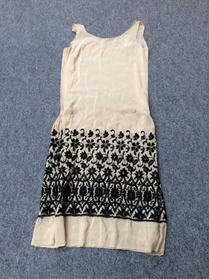 Lot 1044 - Circa 1920's cream silk drop waist dress with...