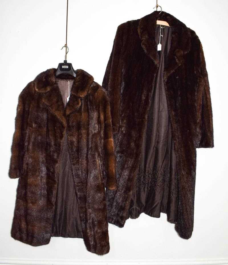 Lot 1049 - A long dark mink coat, together with another...