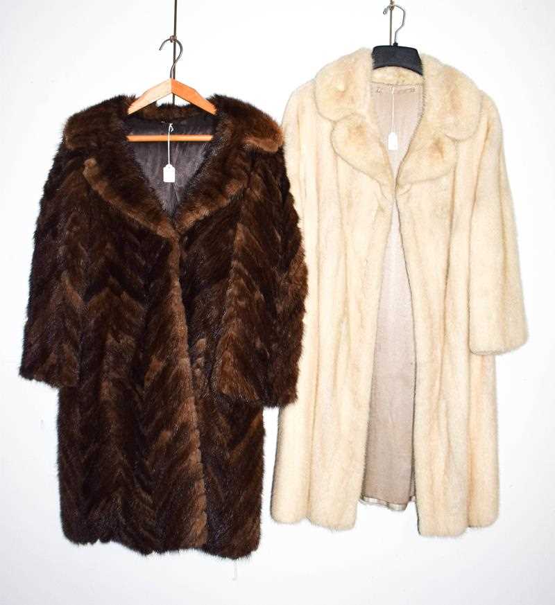 Lot 1053 - A white mink three quarter length coat, and a...