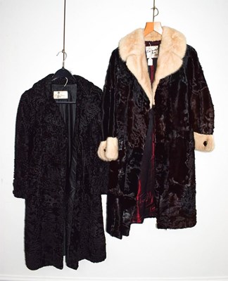 Lot 1054 - A Continental fur Blackpool black hide coat...
