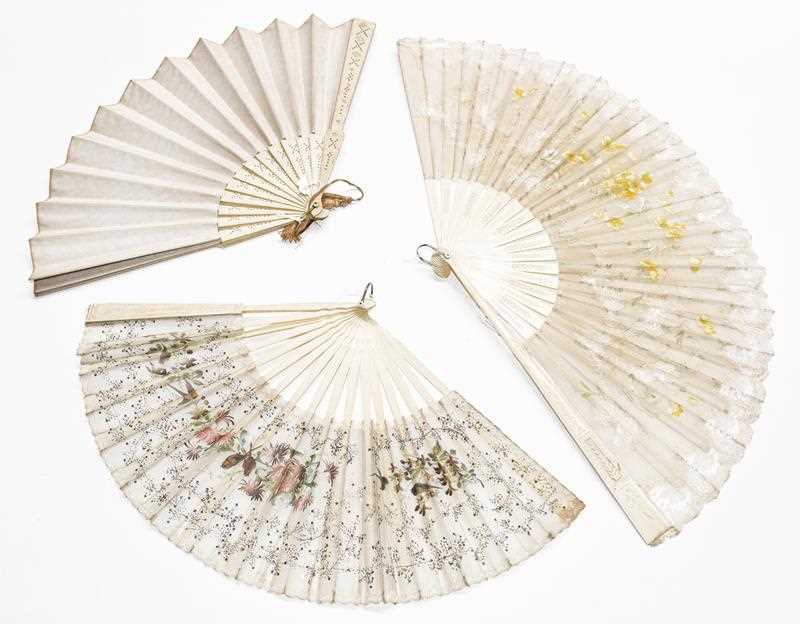 Lot 1065 - Two similar 19th century ivory fans with...
