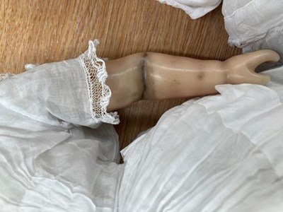 Lot 1074 - Wax head doll Montanari doll, with remains of...