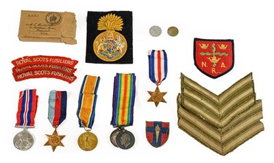 Lot 12 - A Second World War Group of Three Medals,...
