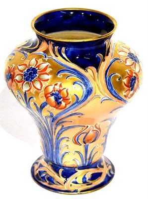 Lot 1 - A Later Macintyre Moorcroft Florian Ware Alhambra Pattern Vase, circa 1903, in typical salmon,...