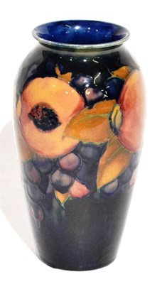 Lot 3 - A William Moorcroft Pomegranate Pattern Vase, on a blue ground, impressed MOORCROFT MADE IN ENGLAND