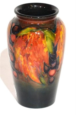 Lot 5 - A William Moorcroft Flambe Leaf and Grape Pattern Vase, impressed POTTER TO H.M THE QUEEN and...