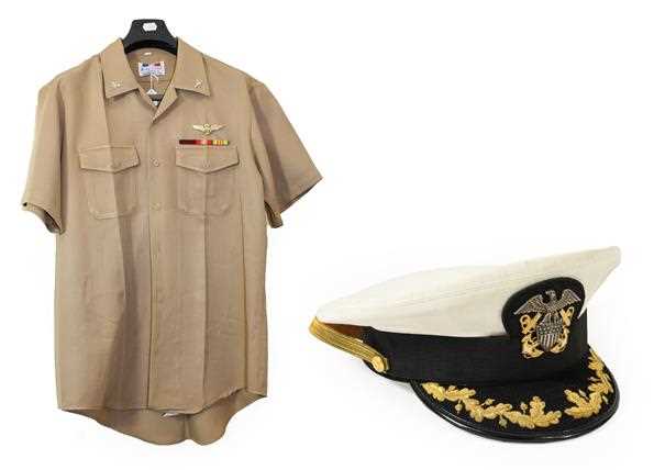 Lot 69 - A US Navy Shirt and Peaked Cap, the shirt in...